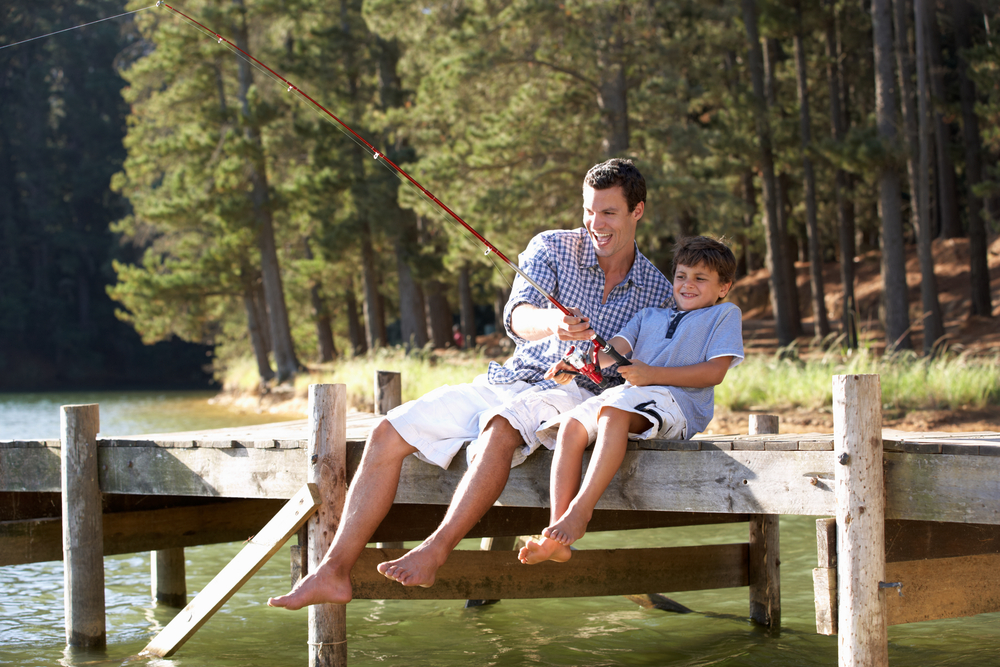 father and son fishing on a dock in Grayson, GA ©Monkey Business Images