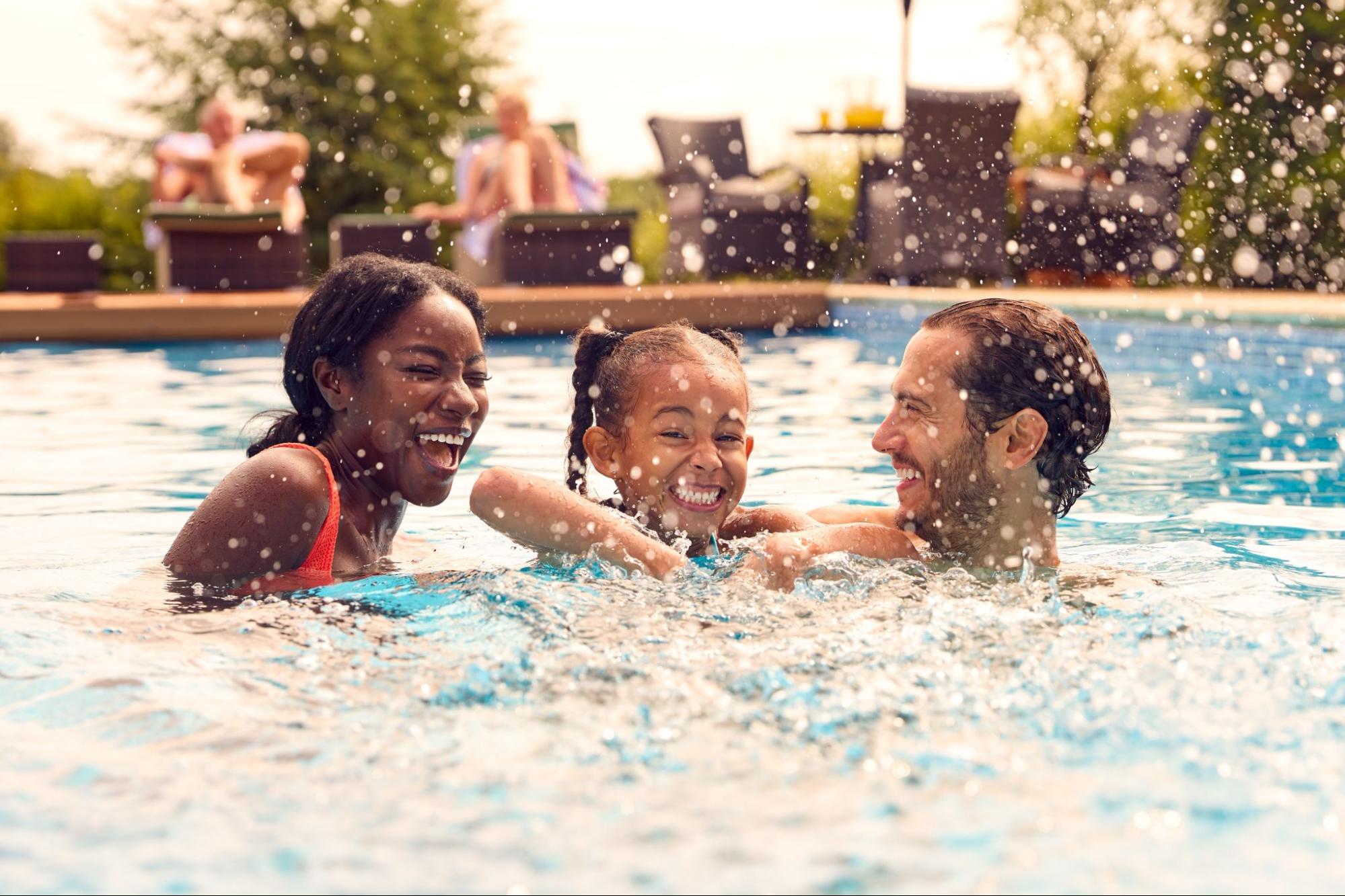 Family swimming in a pool
©Monkey Business Images
