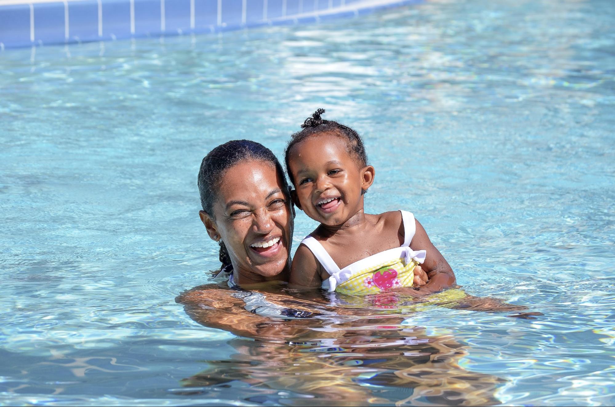 mother and daughter swimming in a pool ©KMLynch