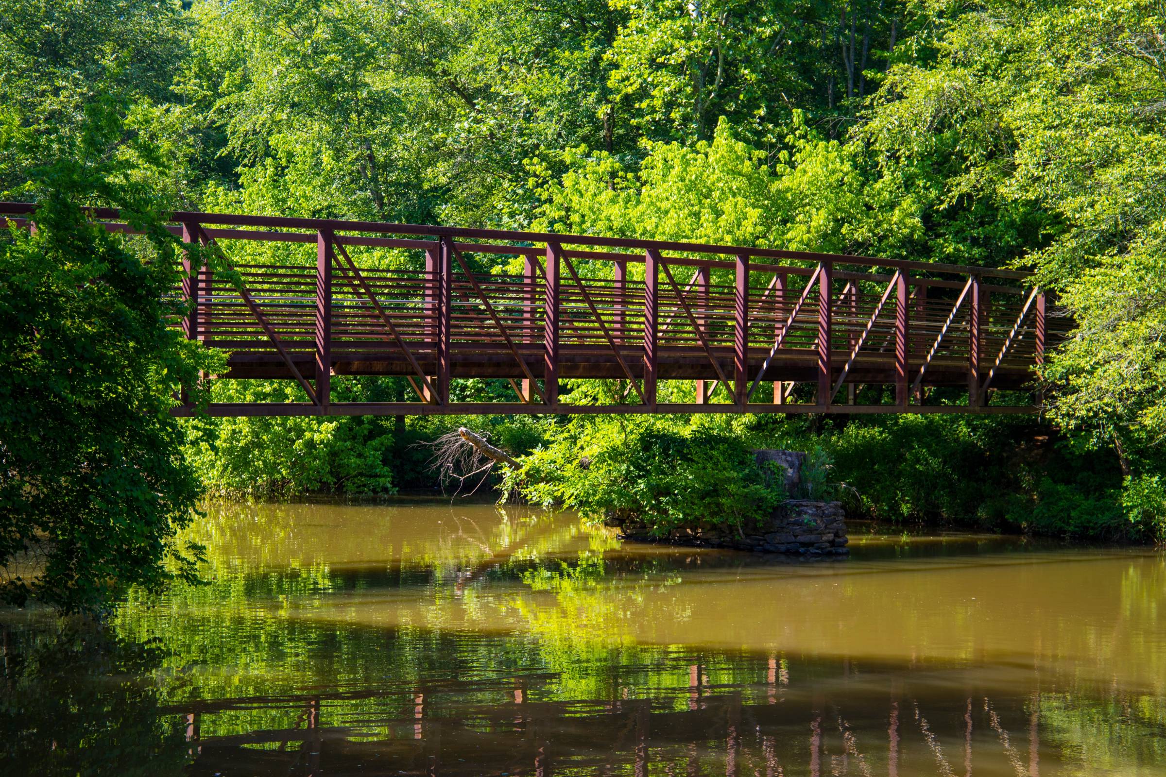 Scenic bridge over water at Olde Rope Mill Park in Woodstock, GA