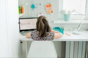 Homework and study lounge with desk, laptop, and organized supplies
©AnikonaAnn