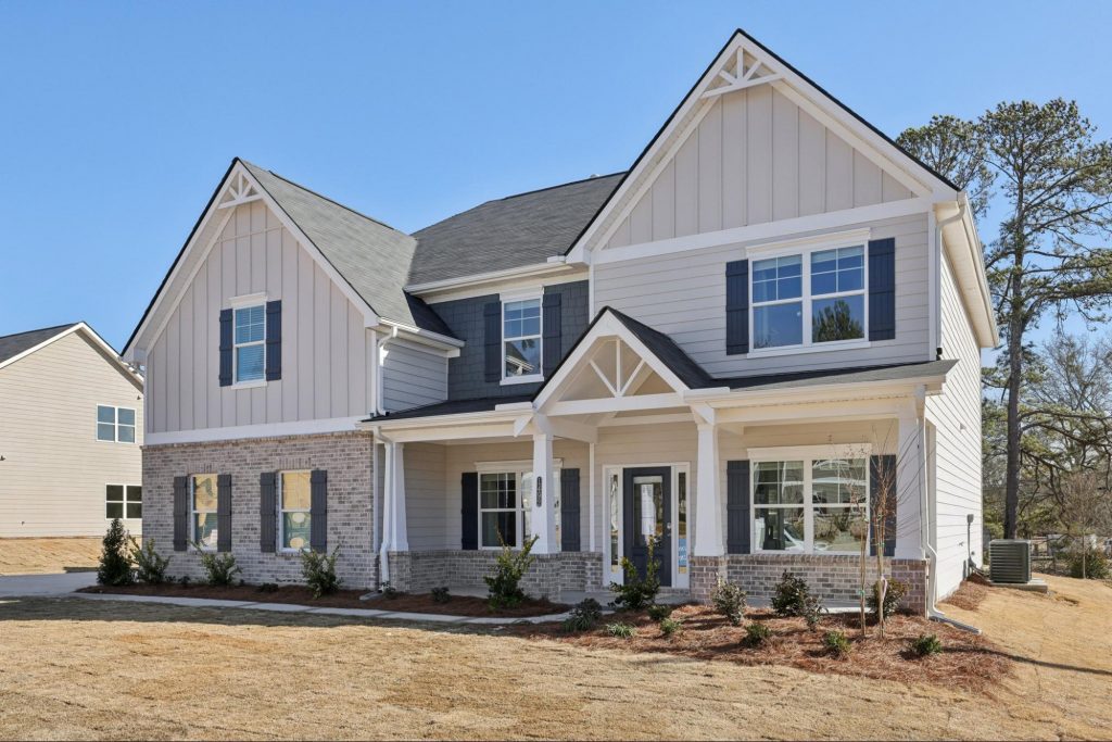Front exterior of a two-story Direct Residential Communities new construction home with modern design

