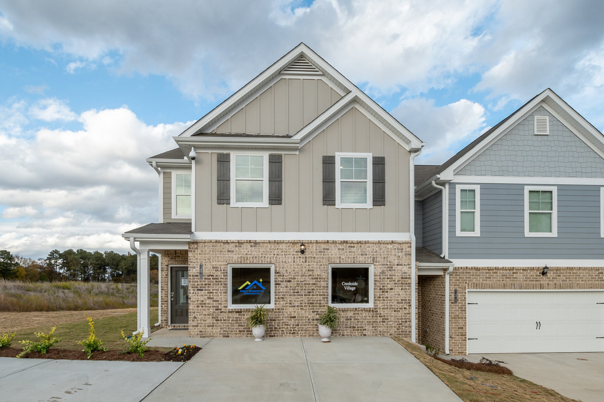 Exterior view of Creekside Village, new townhomes in Lithonia, GA