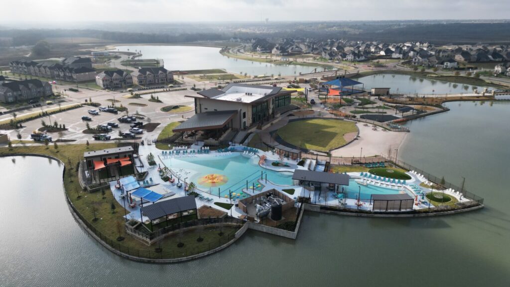 Exterior shot of the back of the Headquarters Amenity Center at Solterra Texas, a master-planned community in DFW