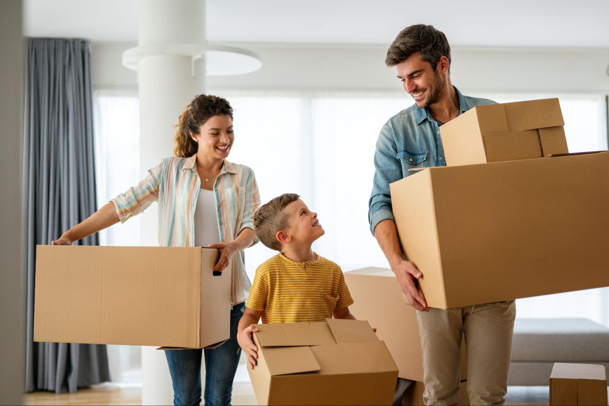 Family moving into their new Atlanta home during the stress-free winter season. ©NDAB Creativity