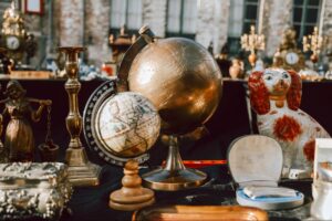 Vintage decor and globes at a local antique shop, one of the best things to do in Winder. © flaMash