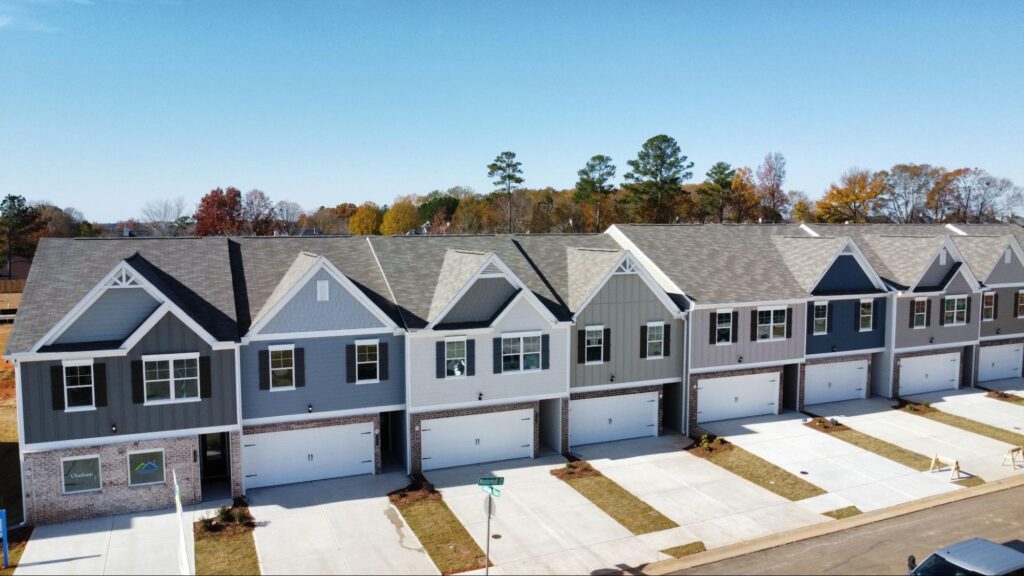 Row of new luxury townhomes in a Metro Atlanta neighborhood by Direct Residential Communities.