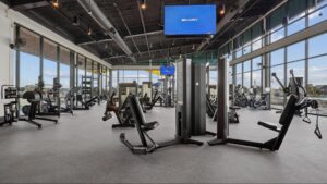 Modern fitness center at Solterra Texas with professional-grade strength training and cardio equipment.