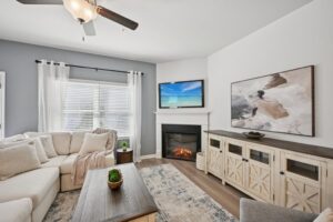 Modern open-concept living room in a Chastain Heights townhome.
