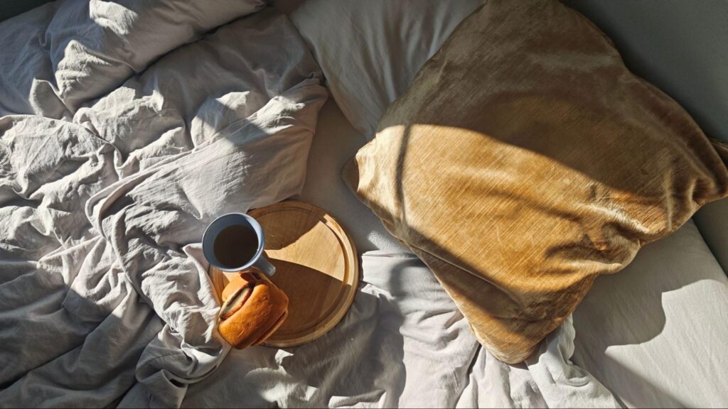 Morning coffee and breakfast in bed on a Saturday morning at Lake Harbin. ©Zhuravska Olena