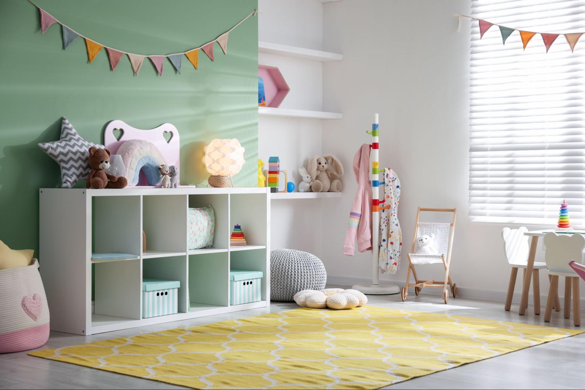 Finished playroom set up in a basement home with cubby storage and colorful decor. ©New Africa