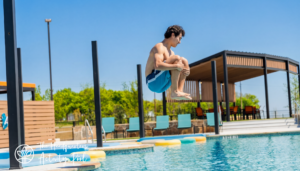 Guy Jumping into pool