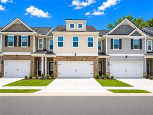 Two-story new construction townhomes at Lake Harbin community in Morrow, Georgia.
