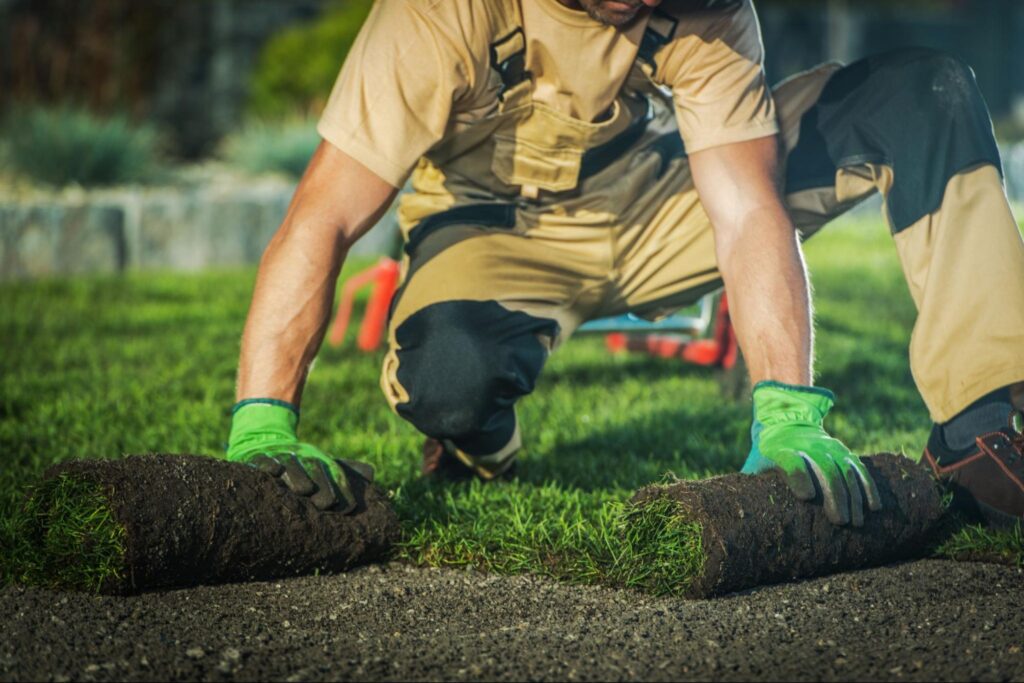 landscaper laying down sod ©Virrage Images